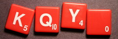 SCRABBLE tile style S70W : Red tile with white letter